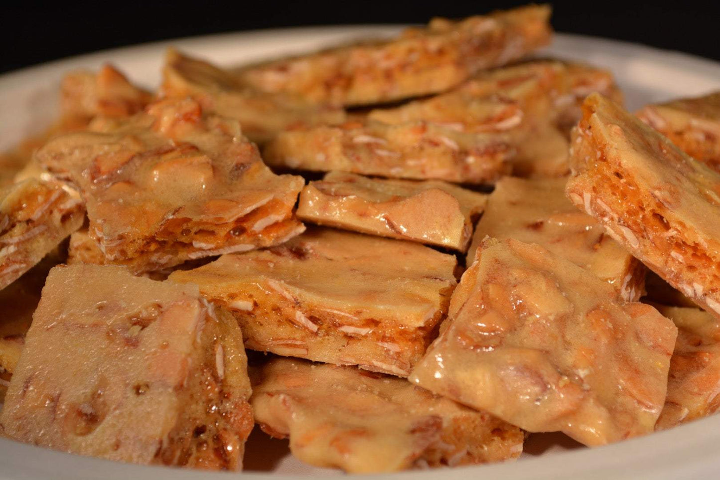 Almond Brittle, Loaded with Sliced Almonds.  Handmade by Granny's Confections.  Made in Michigan