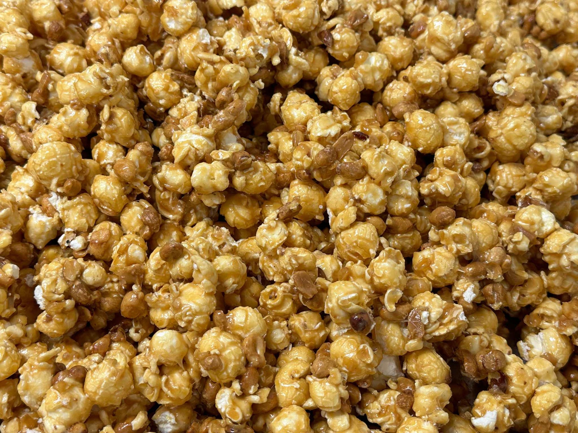 Caramel Popcorn Peanut Popcorn Fusion Combining Air Popped Popcorn and Granny's Confections Famous Handmade Peanut Brittle