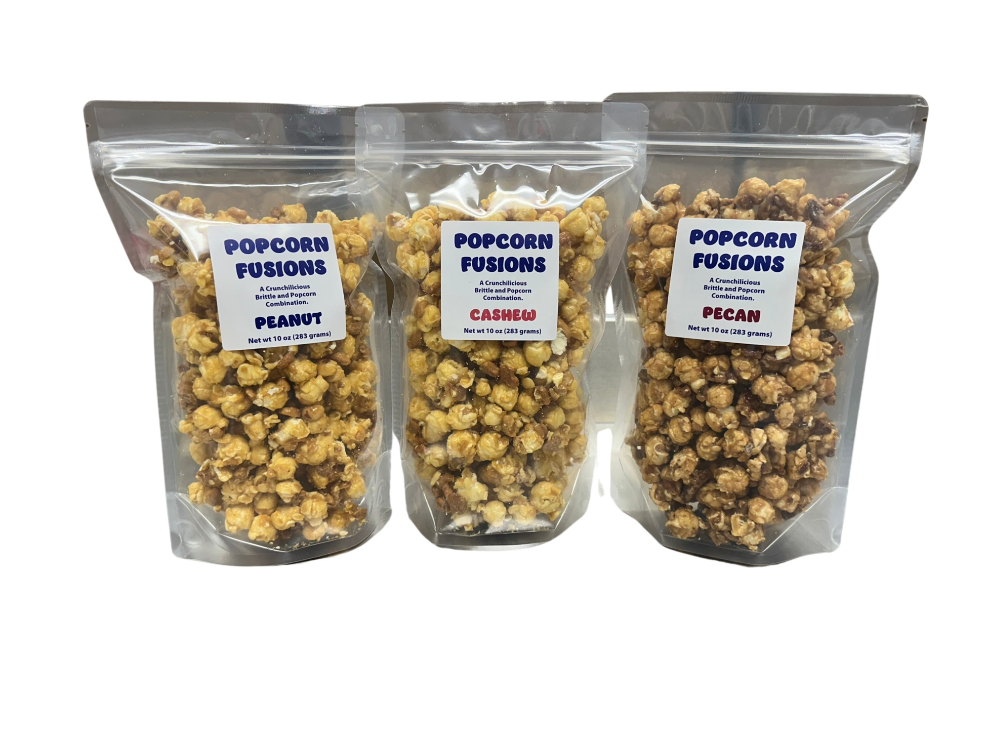 Caramel Popcorn Fusion Gift Box includes Peanut Popcorn, Cashew Popcorn, Pecan Popcorn.  Gluten Free.  Caramel Corn