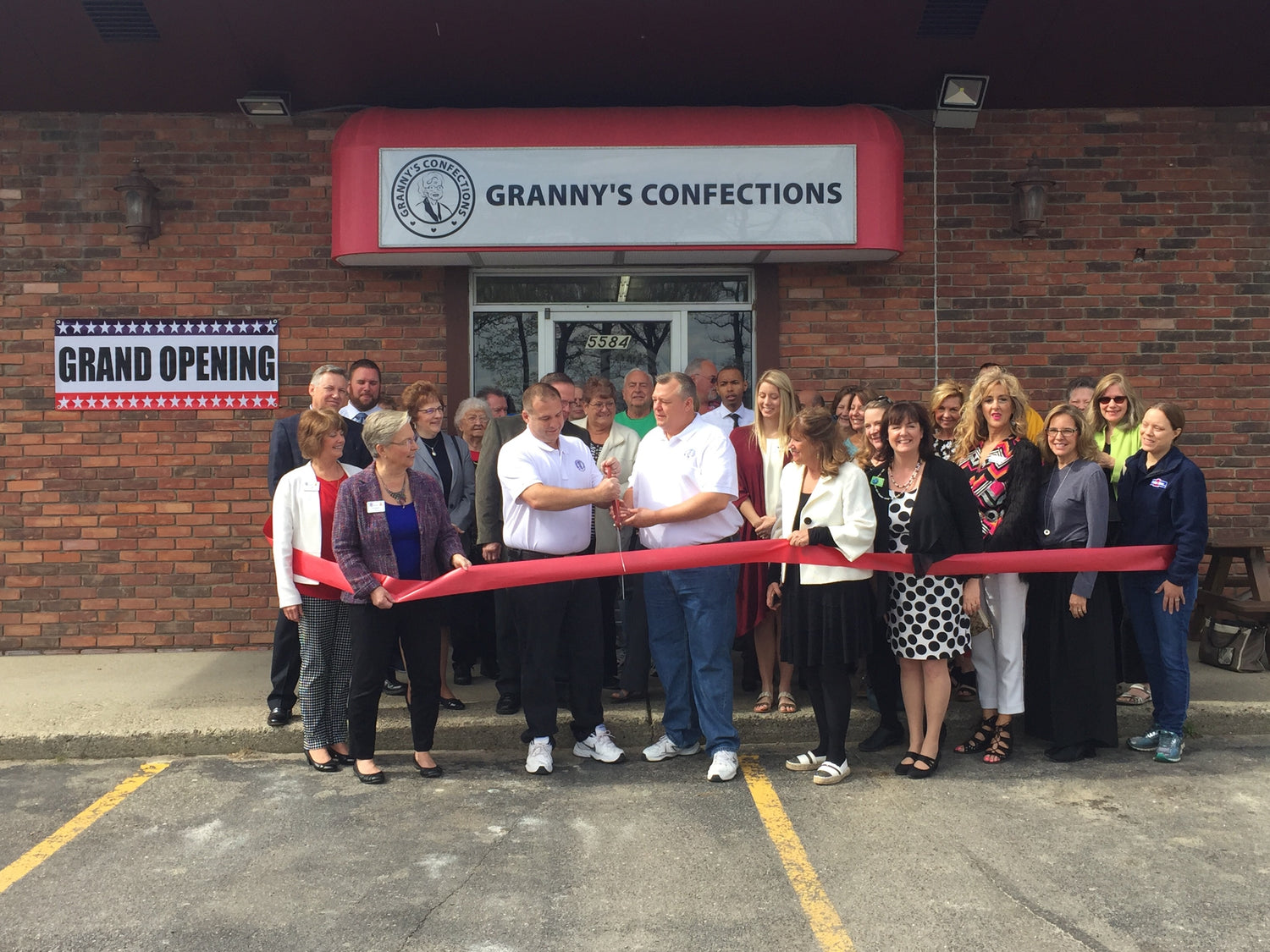 About Us Ribbon Cutting Granny's Confections Handmade Peanut Brittle Caramel Popcorn